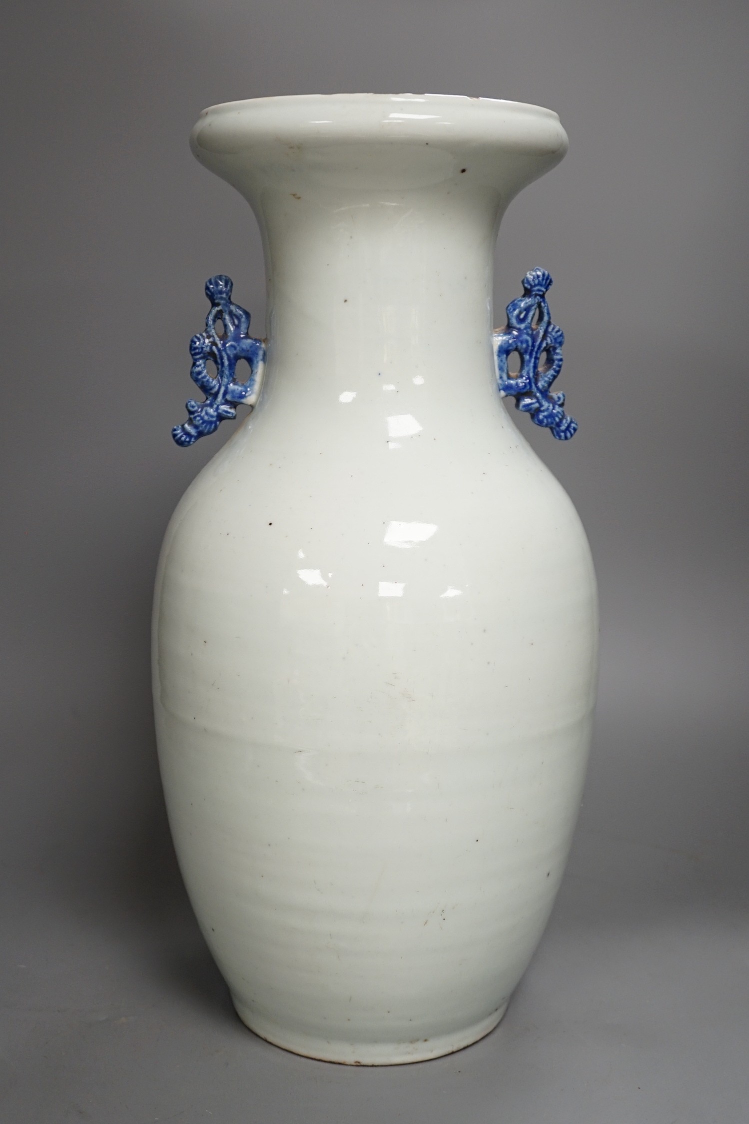 A large late 19th/early 20th century Chinese blue and white vase, 43cm tall